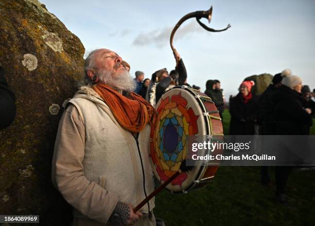 Shaman takes part in the sun rise ceremony during the Winter Solstice at Newgrange on December 21, 2023 in Newgrange, Ireland. Newgrange, a...