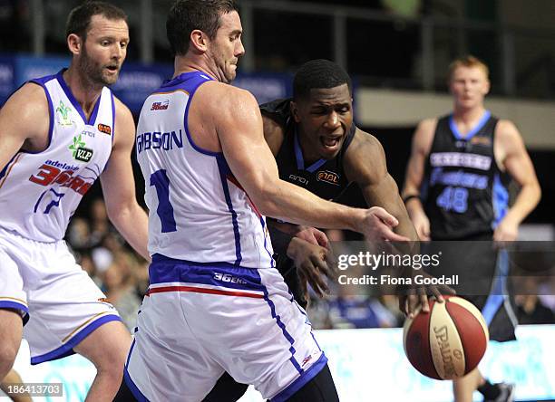 New Zealand Breakers point guard Kerron Johnson is defended by Adam Gibson during the round four NBL match between the New Zealand Breakers and the...