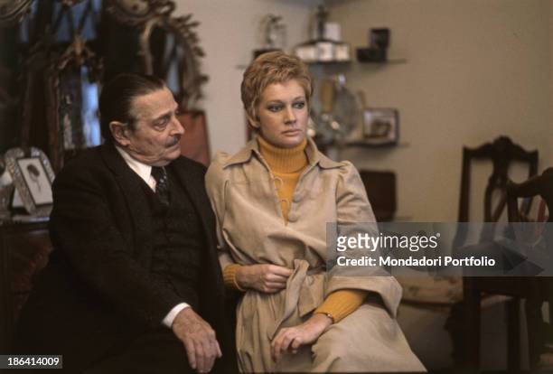 The italian actress Carla Gravina and the producer Alessandro Blasetti. Rome, Italy, 1974.