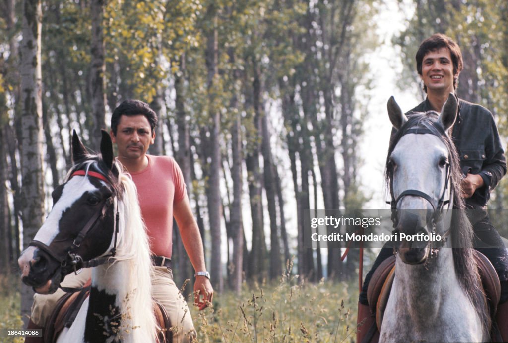 Lucio Battisti and Mogol on their horses