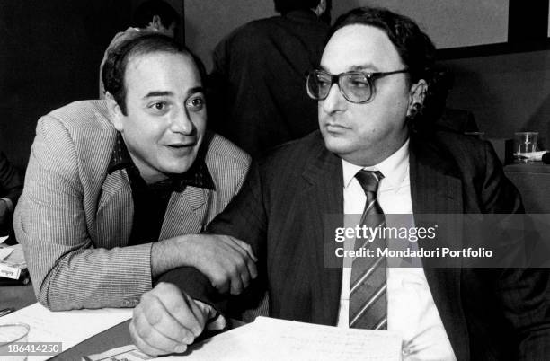 The Minister of State Shareholdings Gianni De Michelis, attending at a meeting of the Italian Socialist Party; sitting to his left Franco Piro, who...