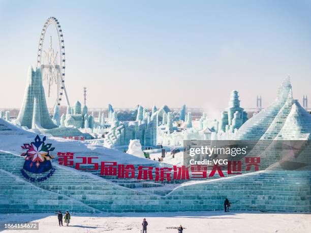Aerial view of tourists viewing ice sculptures at the 25th Harbin Ice and Snow World on December 18, 2023 in Harbin, Heilongjiang Province of China....