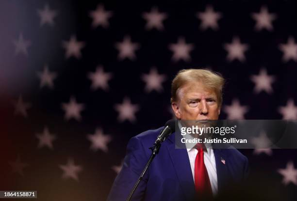 Republican presidential candidate former U.S. President Donald Trump delivers remarks during a campaign rally at the Reno-Sparks Convention Center on...