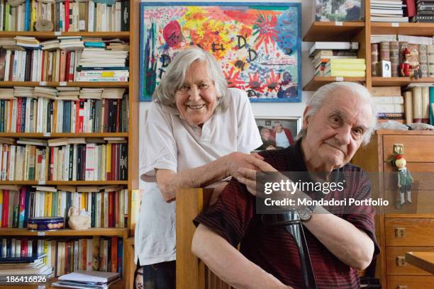 Italian astrophysicist Margherita Hack holding her husband Aldo De Rosa by the hand at home where they keep over twenty thousand books. Trieste, 21st...