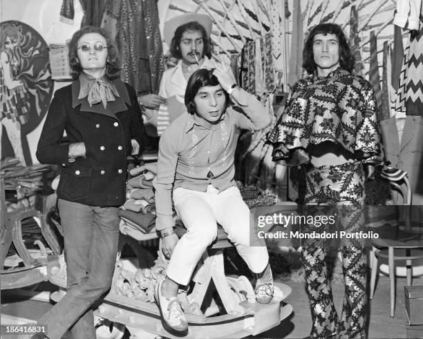 The Equipe 84 band in the grocery store of Solferino street. They bought the grocery store and have it turned into a clothing store. Milan , 1967.