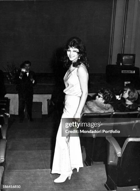 Italian singer, actress and record producer Claudia Mori taking part in the 16th Sanremo Music Festival. Sanremo, 1966.