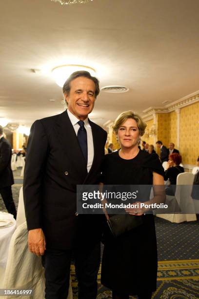 Italian actor, director and singer Christian De Sica smiling beside his wife, Italian producer Silvia Verdone during the reception at the hotel Parco...