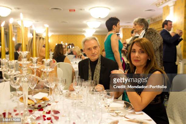 Italian singer-songwriter and composer Amedeo Minghi sitting beside his wife Elena Paladino during the reception at the hotel Parco dei Principi....