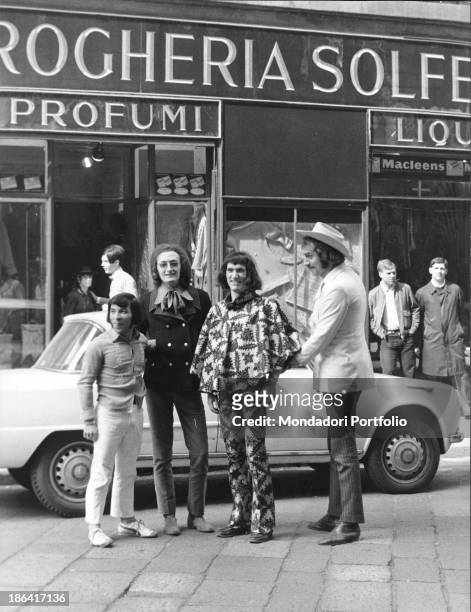 The Equipe 84 band in front of the grocery store of Solferino street. They bought the grocery store and have it turned into a clothing store. Milan ,...