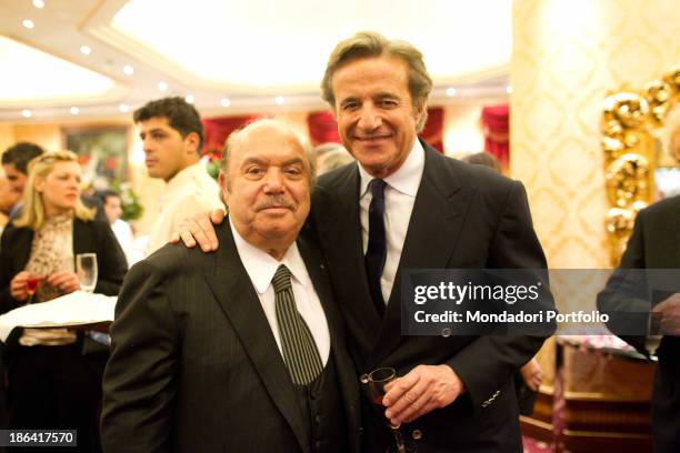 Italian actor and comedian Lino Banfi posing beside Italian actor, director and singer Christian De Sica during the reception at the hotel Parco dei...