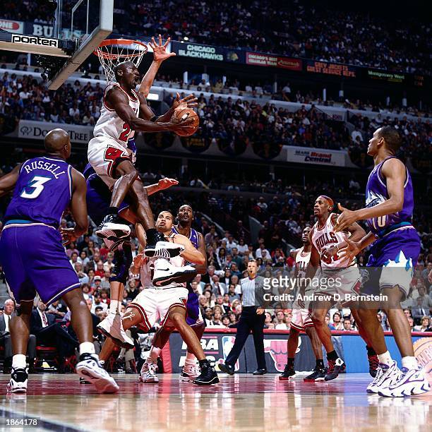 Michael Jordan of the Chicago Bulls drives to the basket against the Utah Jazz during Game Six of the 1997 NBA Championship Finals at the United...