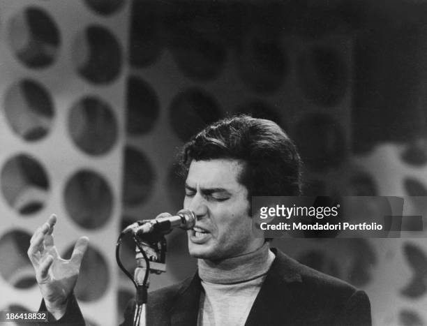Italian singer-songwriter Luigi Tenco performing the song Ciao amore ciao during the 17th Sanremo Music Festival. Sanremo, 26th January 1967.