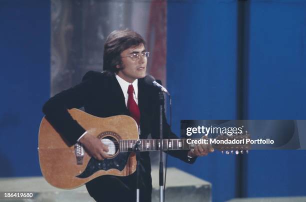 The italian singer Al Bano, born Albano Carrisi, performs during the singing event of the Sanremo Music Festival. Sanremo, Italy, 1968.