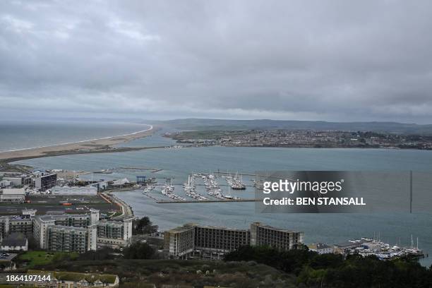 Portland is seen in the foreground and Weymouth beyond, on the south-west coast of England on December 20, 2023. On December 12, one of the men...