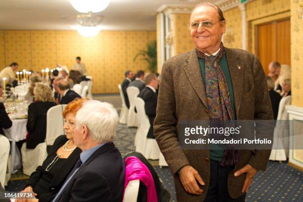 Italian singer-songwriter and showman Renzo Arbore smiling during the reception at the hotel Parco dei Principi. Italian actor and comedian Lino...