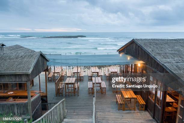 seafront restaurant - portugal beach stock pictures, royalty-free photos & images