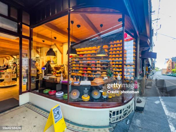 cheese store window, side view - amsterdam market stock pictures, royalty-free photos & images