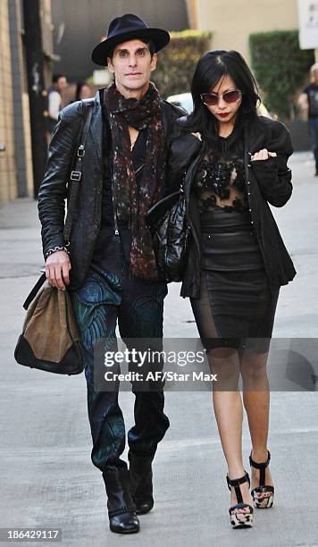 Singer Perry Farrell and Etty Lau Farrell are seen on October 30, 2013 in Los Angeles, California.