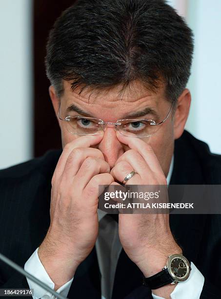 Foreign Minister of Slovakia Miroslav Lajcak listens to a journalist's question during a press conference at the break time of a joint meeting of the...