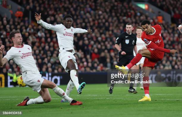 Cody Gakpo of Liverpool shoots at goal in the second half during the Premier League match between Liverpool FC and Manchester United at Anfield on...