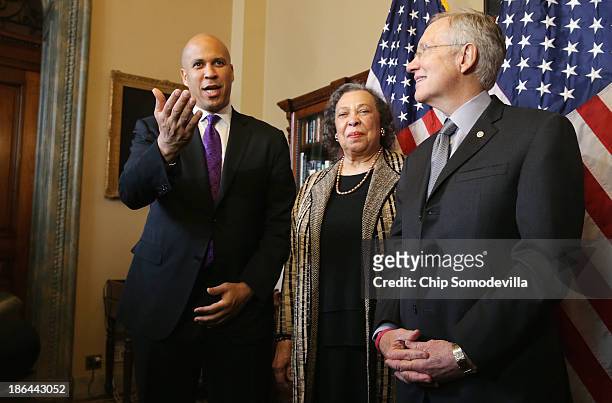 Senate Majority Leader Harry Reid meets with former Newark, New Jersey Mayor Cory Booker and his mother Carolyn Booker prior to Cory Booker's...