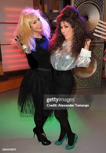 Satcha Pretto and Maity Interiano celebrate Halloween on the set of Univisions "Despierta America" at Univision Headquarters on October 31, 2013 in...