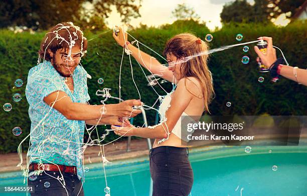 teenagers at pool party - summer comedies party stockfoto's en -beelden