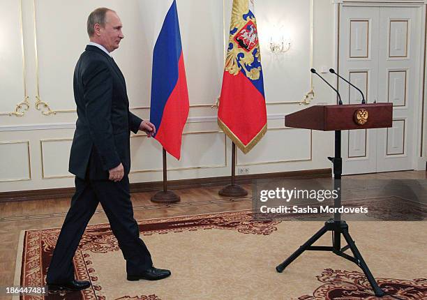 Russian President Vladimir Putin arrives at a meeting with the winners of the 2013 World Combat Games October 31, 2013 in Moscow, Russia. The Russian...