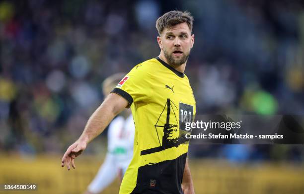 Niclas Füllkrug of Borussia Dortmund disappointed during the Bundesliga match between FC Augsburg and Borussia Dortmund at WWK-Arena on December 16,...