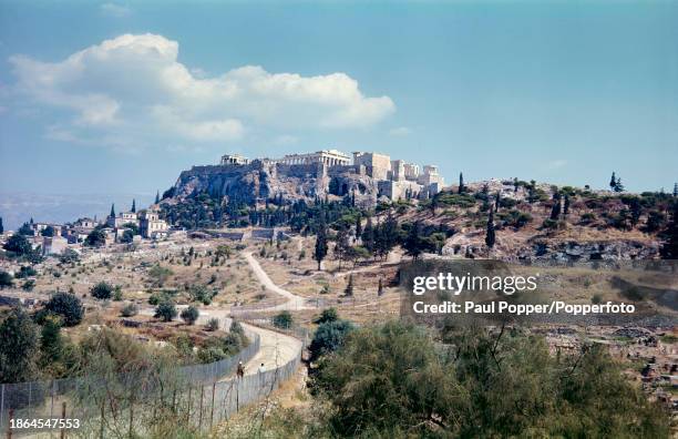 View from the site of the Ancient Agora of Athens of the Acropolis of Athens, a former temple dedicated to the goddess Athena, on a hill above the...