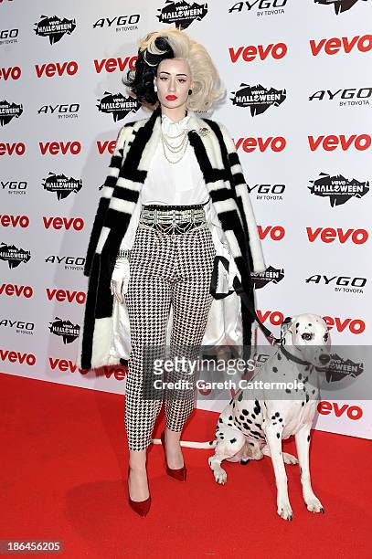 Iggy Azalea dressed as Cruella de Vil attends the VEVO Halloween showcase at The Oval Space on October 31, 2013 in London, England.