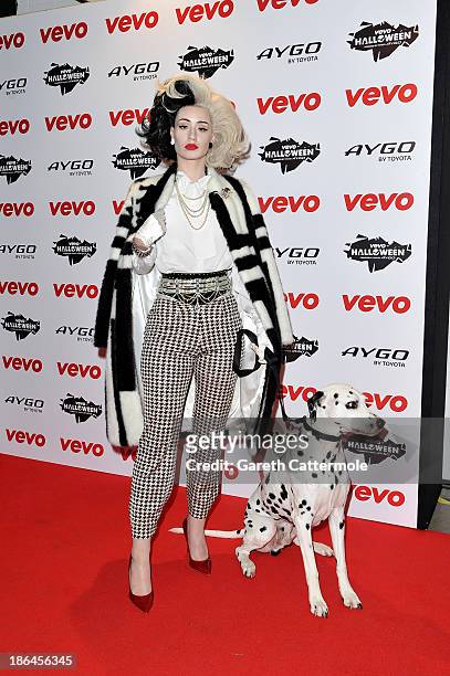 Iggy Azalea dressed as Cruella de Vil attends the VEVO Halloween showcase at The Oval Space on October 31, 2013 in London, England.