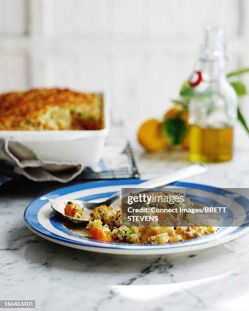 Plate Of Pumpkin Pasta Bake With Breadcrumbs, Foto de stock