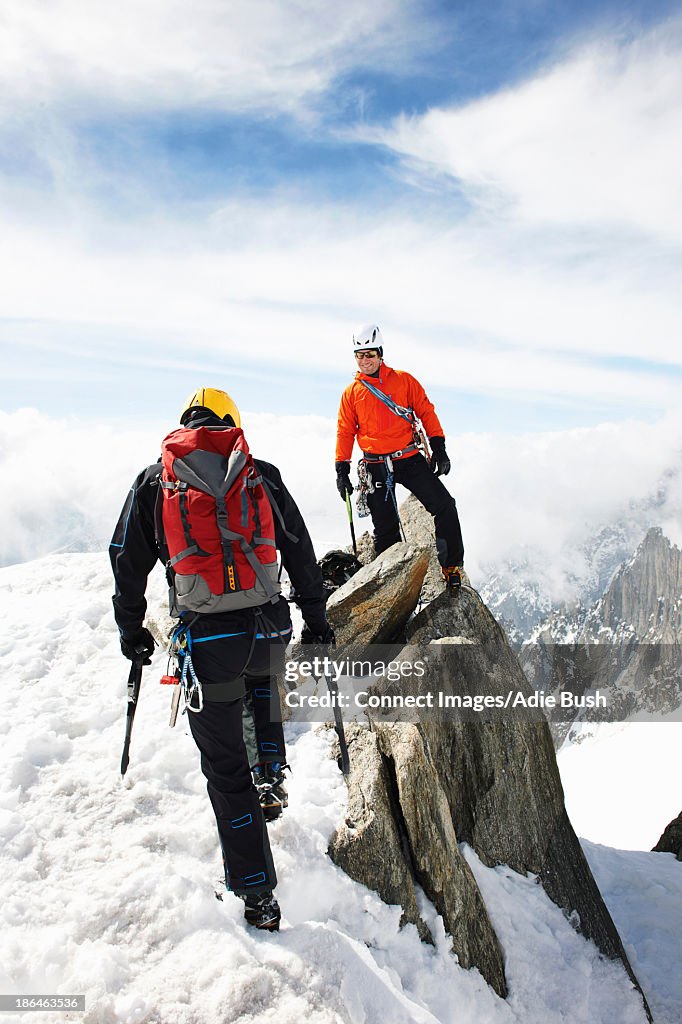 Two men climbing in mountains, Chamonix, France