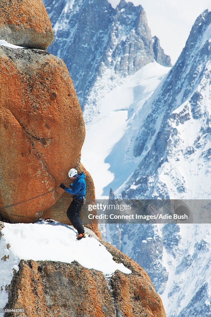 Mature man mountain climbing, Chamonix, France