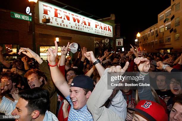 Fans react outside of Fenway Park as the Red Sox head to the World Series after winning Game Six of the American League Champion Series agoinst the...