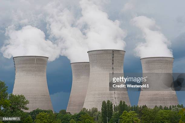 france, rhone, smoking cooling towers of power plant - nuclear power station stock pictures, royalty-free photos & images