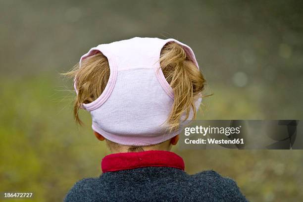 girl wearing underpants on her head - kids in undies stock-fotos und bilder