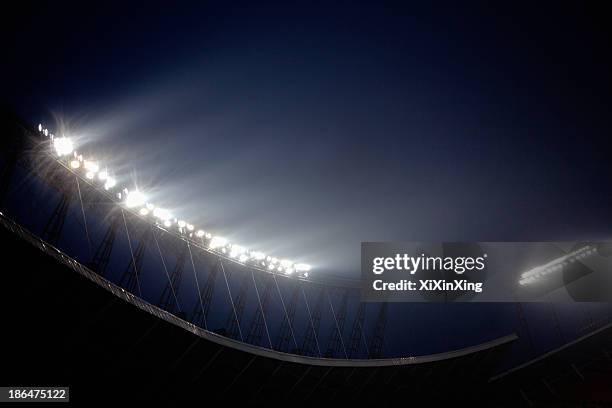 stadium floodlights at night time, beijing, china - lumière de stade ou de chantier photos et images de collection