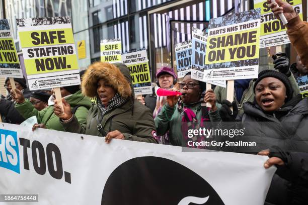 Workers from the UNITE trade union, whom are presently in dispute with St Bart's Hospital Trust, protest outside the Department of Health and Social...