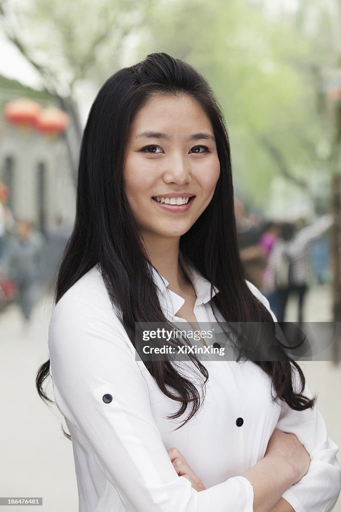 Young Woman smiling and looking at camera