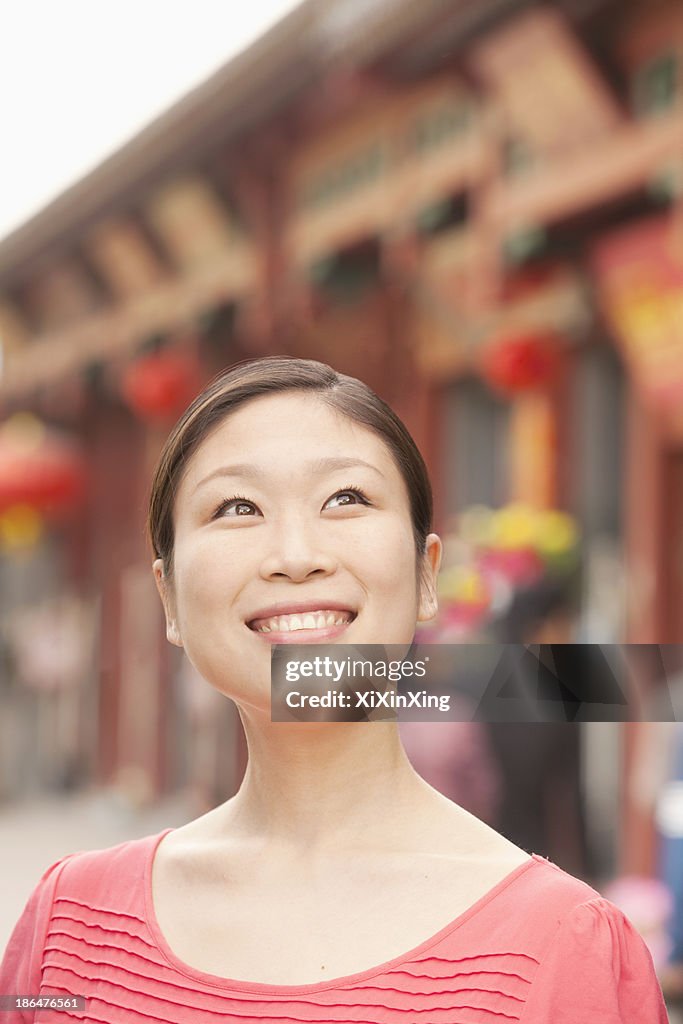 Young Woman smiling and looking away