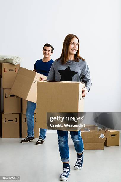 Box Person Two People Carrying Boxes Photos and Premium High Res Pictures - Getty ...