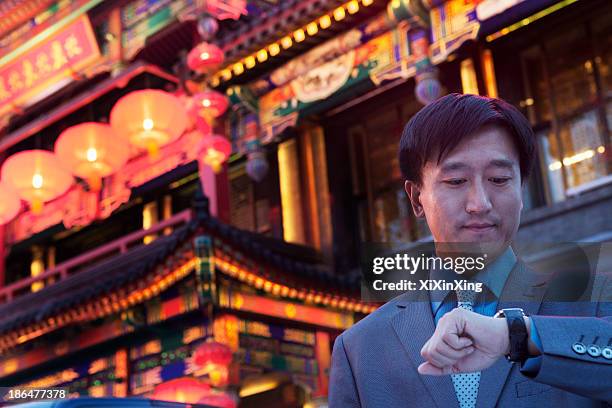 Businessmen Checking His Watch, Foto de stock
