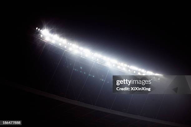 stadium floodlights at night time, beijing, china - lumière de stade ou de chantier photos et images de collection