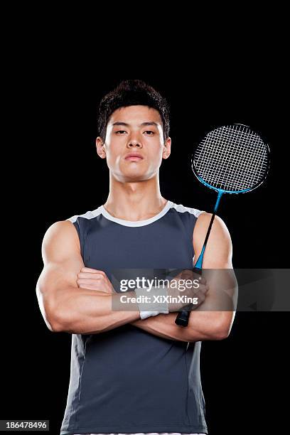 man with badminton racket, portrait - badminton stock pictures, royalty-free photos & images