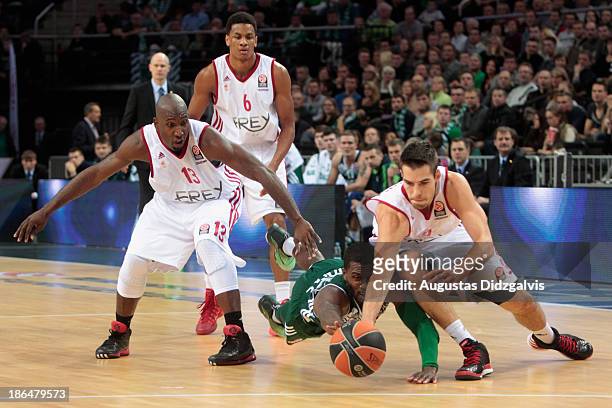 Jeremy Leloup, #9 of Strasbourg competes with Justin Dentmon, #55 of Zalgiris during the 2013-2014 Turkish Airlines Euroleague Regular Season Date 3...