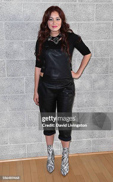 Singer Guinevere poses at her live performance and meet & greet at VEVO headquarters on October 31, 2013 in Los Angeles, California.