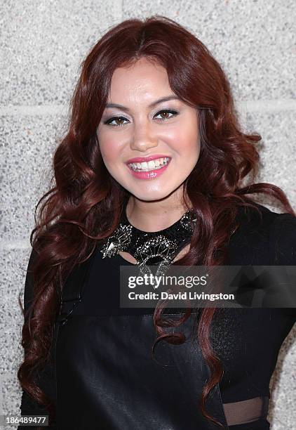 Singer Guinevere poses at her live performance and meet & greet at VEVO headquarters on October 31, 2013 in Los Angeles, California.
