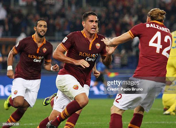 Marco Borriello with his teammates of AS Roma celebrates after scoring the opening goal during the Serie A match between AS Roma and AC Chievo Verona...